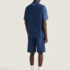 Bermuda en denim avec coutures couture et tampon Givenchy Bermuda en denim avec coutures couture et tampon Givenchy