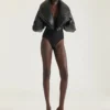 Mules à talons Boudoir en cuir verni à franges