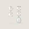 Boucles d’oreilles asymétriques à pointes en métal et perles Boucles d’oreilles asymétriques à pointes en métal et perles