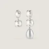 Boucles d’oreilles asymétriques à pointes en métal et perles Boucles d’oreilles asymétriques à pointes en métal et perles