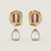 Boucles d&rsquo;oreilles clip sculpturales en métal et cristaux