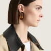 Boucles d&rsquo;oreilles en métal et résine