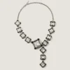 Collier « Crystals » déstructuré en métal et cristaux Collier « Crystals » déstructuré en métal et cristaux
