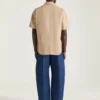 Jeans bleu indigo à coutures couture avec imprimé Givenchy Jeans bleu indigo à coutures couture avec imprimé Givenchy