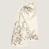 Jupe longue en satin avec nœud et broderies Jupe longue en satin avec nœud et broderies