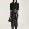 Jupe midi drapée en cuir nappa Jupe midi drapée en cuir nappa