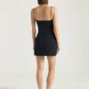 Mini-robe échancrée en crêpe cady Mini-robe échancrée en crêpe cady