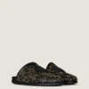 Mules plates Label en cuir avec clous