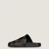 Mules plates Label en cuir avec clous