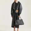 Veste aviateur courte en cuir et peau de mouton Veste aviateur courte en cuir et peau de mouton