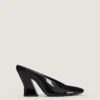 Mules à talons sculptées en cuir verni Mules à talons sculptées en cuir verni