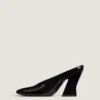 Mules à talons sculptées en cuir verni Mules à talons sculptées en cuir verni