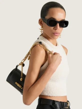 Petit sac Pout en cuir avec chaîne porte-bonheur