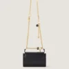 Petit sac Pout en cuir avec chaîne porte-bonheur Petit sac Pout en cuir avec chaîne porte-bonheur