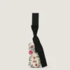 Pochette de soirée avec broderies florales et nœud Pochette de soirée avec broderies florales et nœud