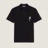 Polo en coton avec broderie en cristaux Polo en coton avec broderie en cristaux