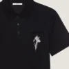 Polo en coton avec broderie en cristaux Polo en coton avec broderie en cristaux