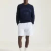 Pull en maille de coton avec broderie « Givenchy Paris » Pull en maille de coton avec broderie « Givenchy Paris »