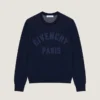 Pull en maille de coton avec broderie « Givenchy Paris » Pull en maille de coton avec broderie « Givenchy Paris »