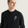 Pull en maille de laine avec broderie de cristaux Pull en maille de laine avec broderie de cristaux