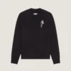 Pull en maille de laine avec broderie de cristaux Pull en maille de laine avec broderie de cristaux