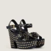 Sandales compensées en cuir avec clous Sandales compensées en cuir avec clous
