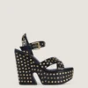 Sandales compensées en cuir avec clous Sandales compensées en cuir avec clous