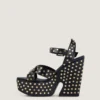 Sandales compensées en cuir avec clous Sandales compensées en cuir avec clous