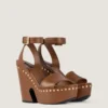 Sandales à plateforme de style sabots en cuir avec clous