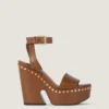 Sandales à plateforme de style sabots en cuir avec clous