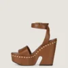 Sandales à plateforme de style sabots en cuir avec clous