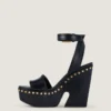 Sandales à plateforme de style sabots en cuir avec clous
