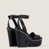 Sandales à plateforme de style sabots en cuir avec clous