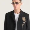 Veste courte à simple boutonnage ornée, en laine Veste courte à simple boutonnage ornée, en laine