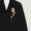Veste courte à simple boutonnage ornée, en laine Veste courte à simple boutonnage ornée, en laine