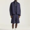 Veste à coutures couture en denim brodé « Givenchy Paris » Veste à coutures couture en denim brodé « Givenchy Paris »