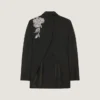 Veste à double boutonnage fendue en laine avec paillettes Veste à double boutonnage fendue en laine avec paillettes